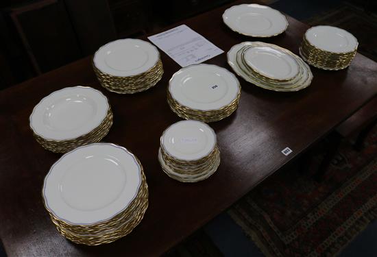 A Cauldon gilt decorated dinner service (made for Maples)